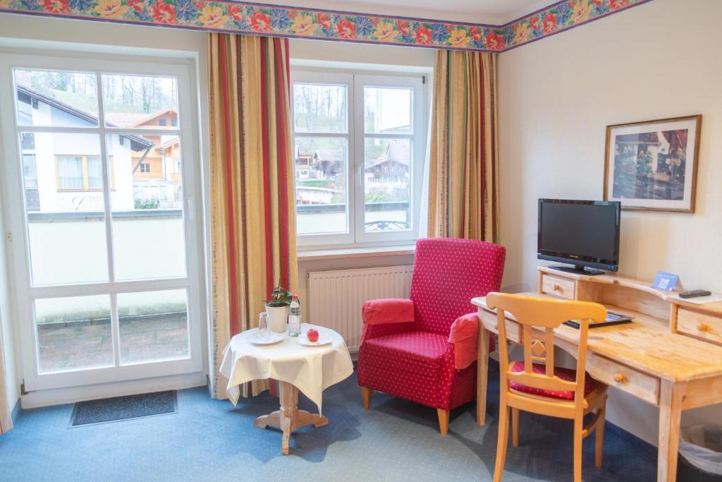 TV a/nebo společenská místnost v ubytování Aktiv Hotel Schweiger
