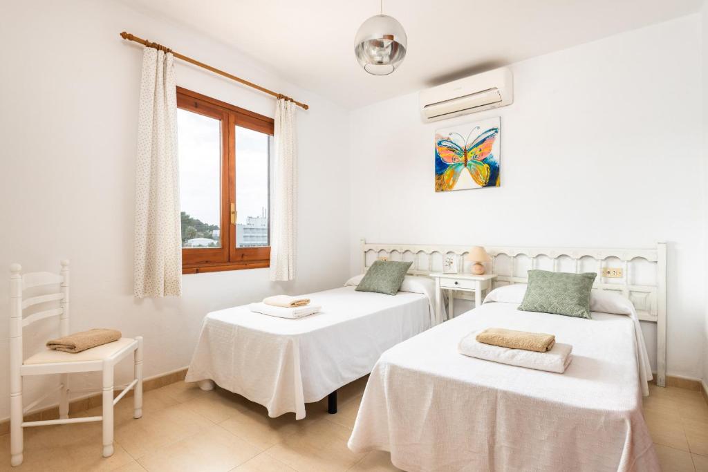Postel nebo postele na pokoji v ubytování Villa Spring Hill - Cala Galdana