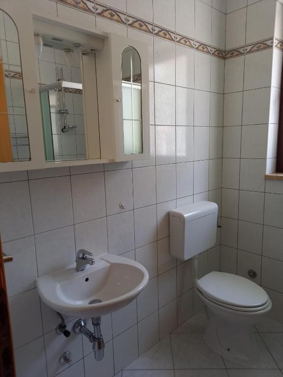 Koupelna v ubytování Apartment Smajlovic