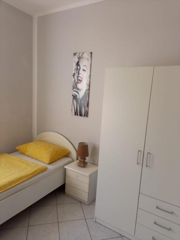Postel nebo postele na pokoji v ubytování Apartment Smajlovic