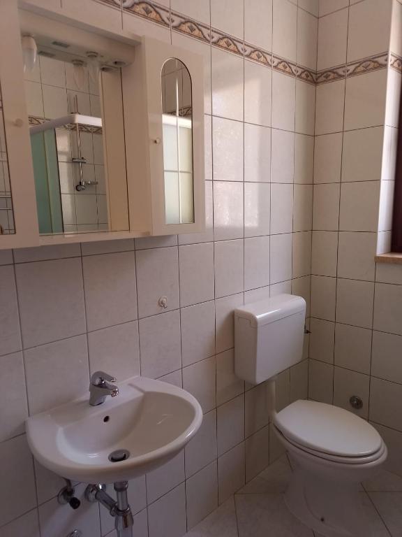 Koupelna v ubytování Apartment Smajlovic