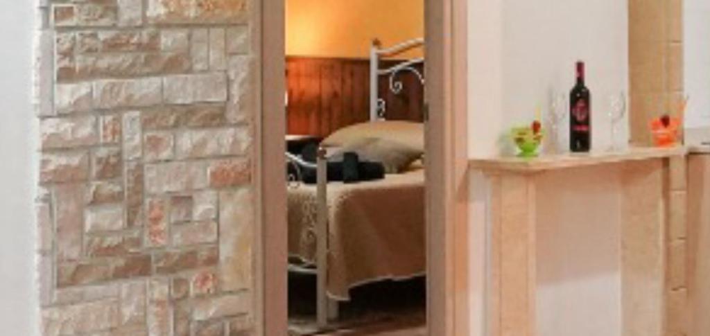Łóżko lub łóżka w pokoju w obiekcie Guesthouse da Filiberto