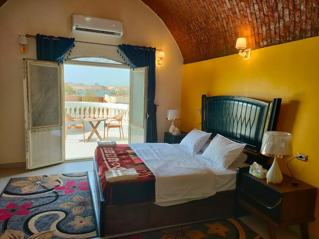 Postel nebo postele na pokoji v ubytování Abu simbel Nubian Guest House
