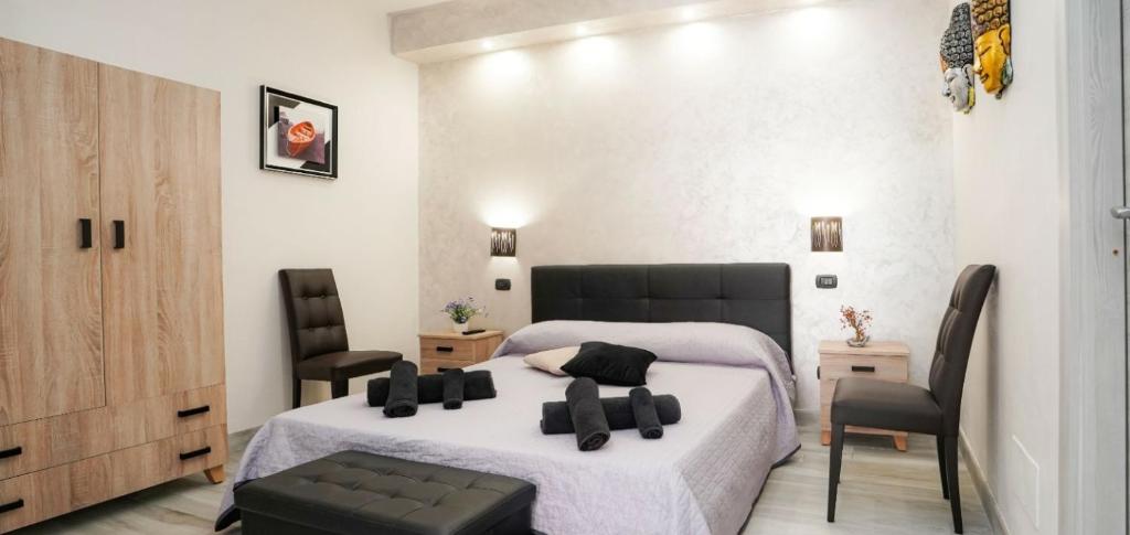 Łóżko lub łóżka w pokoju w obiekcie Guesthouse da Filiberto