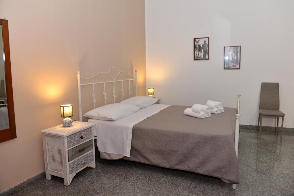 Posteľ alebo postele v izbe v ubytovaní Casa Liolà