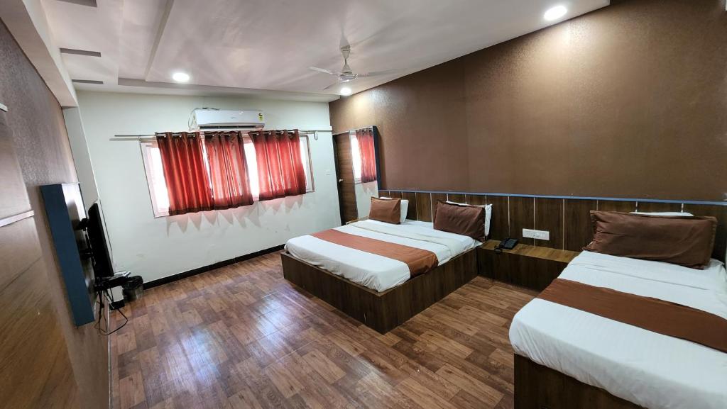 Postel nebo postele na pokoji v ubytování Hotel Nova Prime