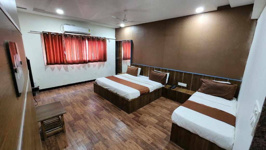 Postel nebo postele na pokoji v ubytování Hotel Nova Prime