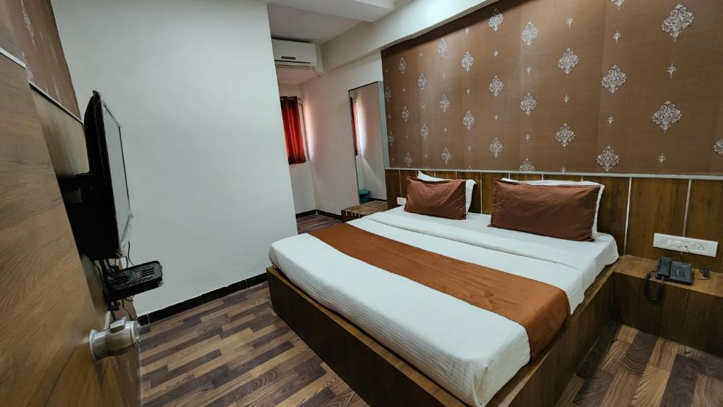 Postel nebo postele na pokoji v ubytování Hotel Nova Prime