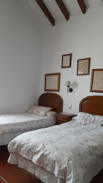 Postel nebo postele na pokoji v ubytování Posada la Torre
