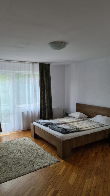 Postel nebo postele na pokoji v ubytování BigCitty Rooms
