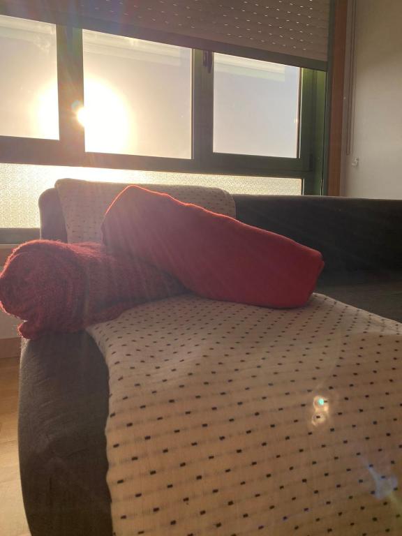 Posteľ alebo postele v izbe v ubytovaní Apartamento Chinijo