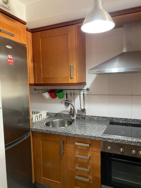 Kuchyňa alebo kuchynka v ubytovaní Apartamento Chinijo