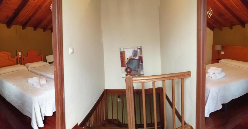 A bed or beds in a room at Complejo la Regalina