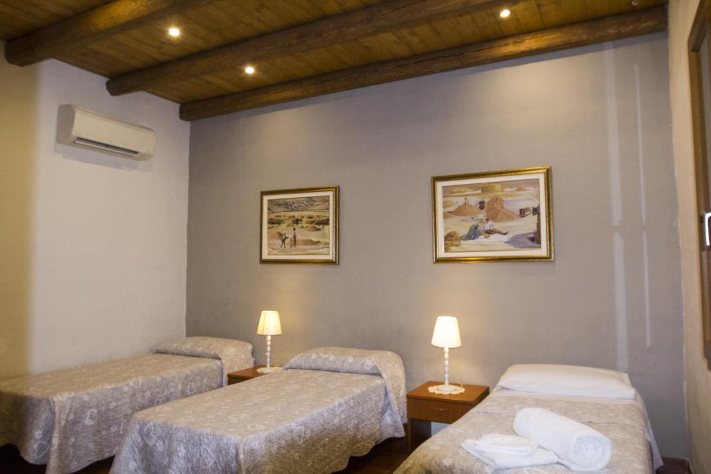 Postel nebo postele na pokoji v ubytování House Suestellas