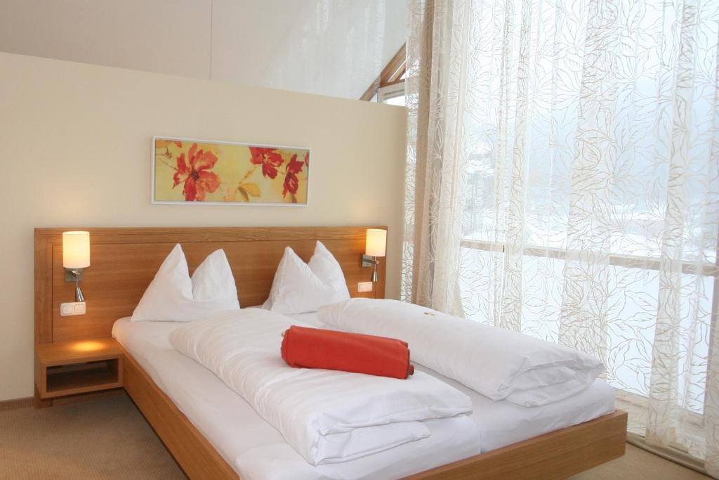 Postel nebo postele na pokoji v ubytování Hotel Hollweger