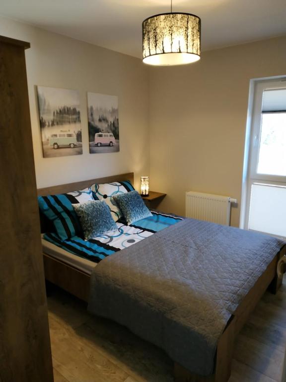Posteľ alebo postele v izbe v ubytovaní Apartament na Szlaku Szklarska Poręba