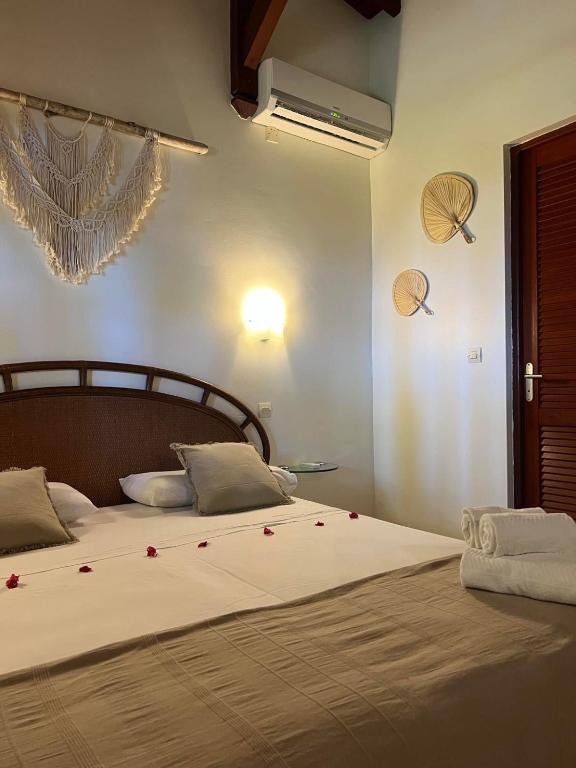 Postel nebo postele na pokoji v ubytování Residence AU 'TI SUCRIER