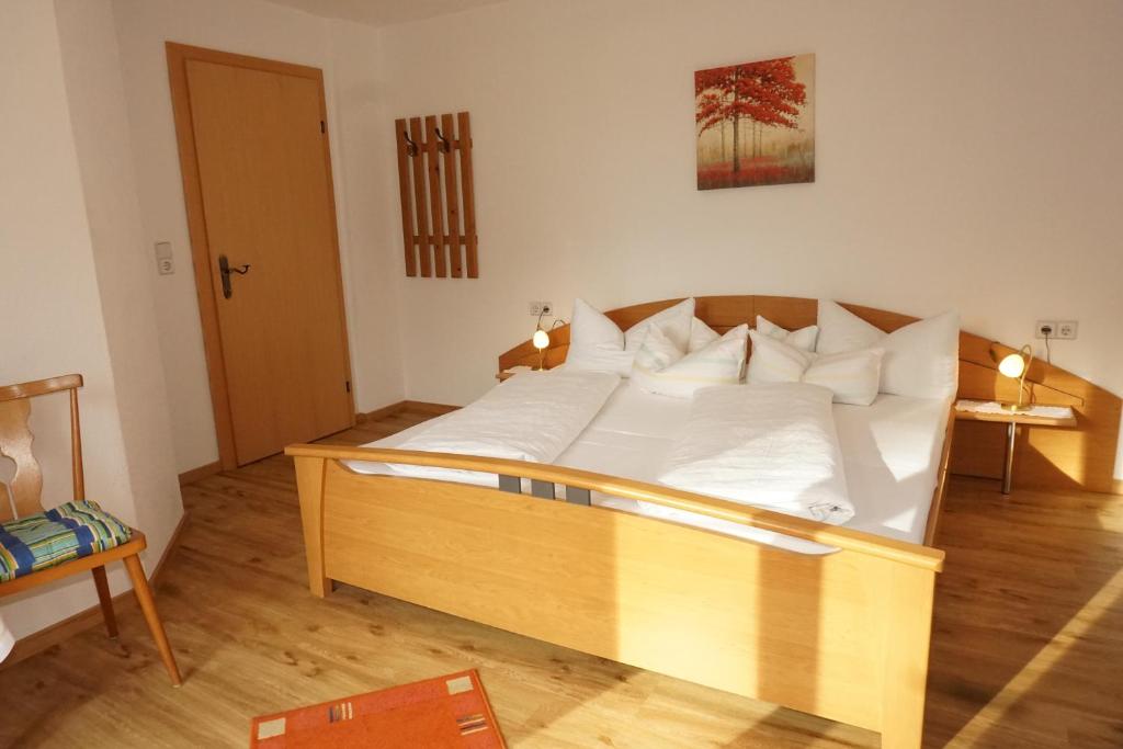Postel nebo postele na pokoji v ubytování Haus Dornauer