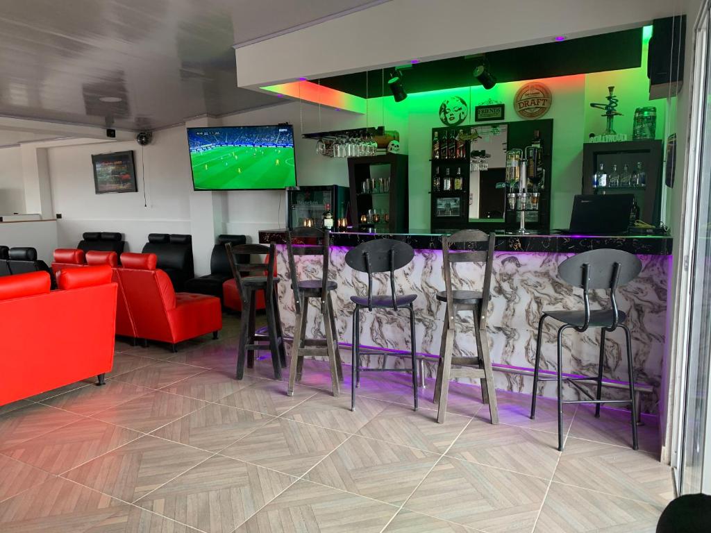 TV a/nebo společenská místnost v ubytování Hotel Casa Modelia