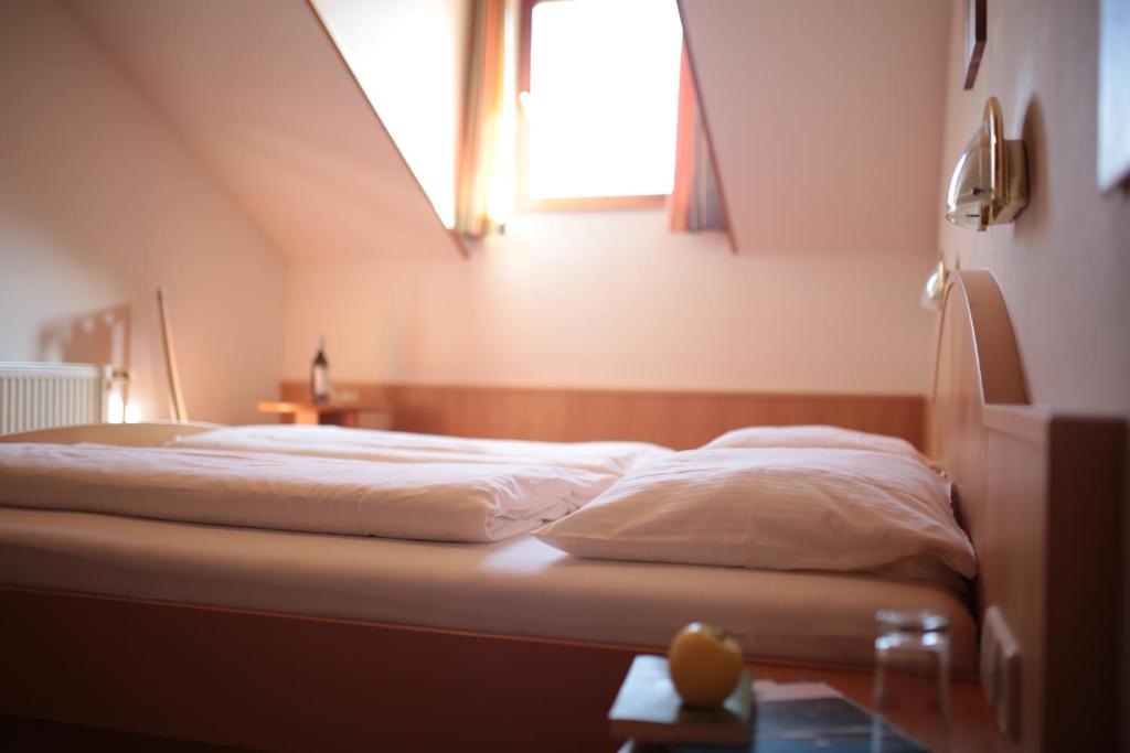 Postel nebo postele na pokoji v ubytování Kastnerhof