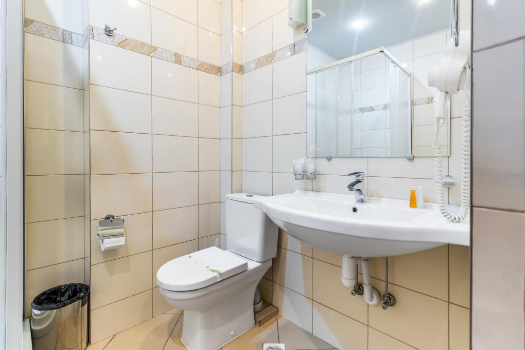 Koupelna v ubytování Regency Hotel