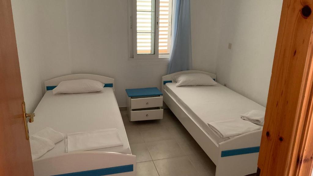 Postel nebo postele na pokoji v ubytování Mare - Rooms
