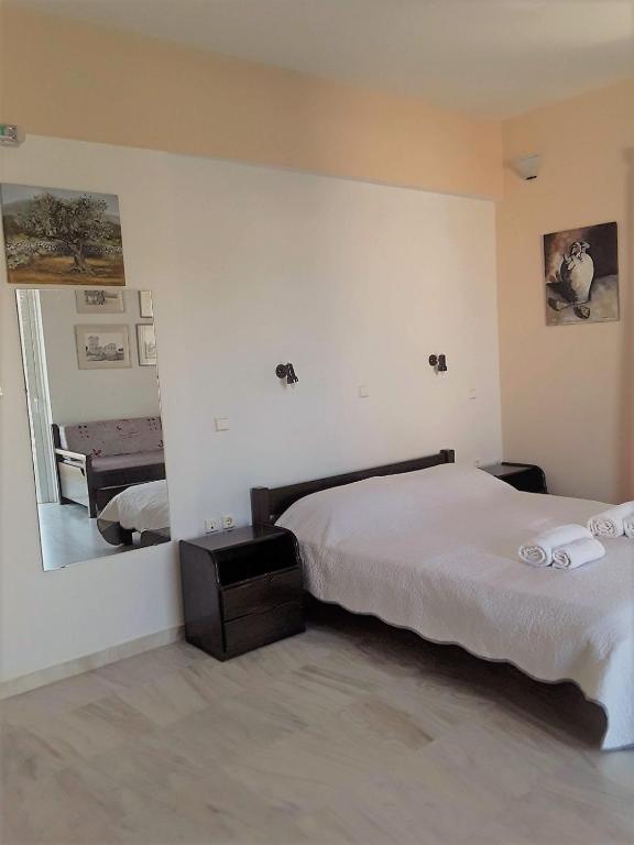 Postel nebo postele na pokoji v ubytování Areti & Maria Apartments