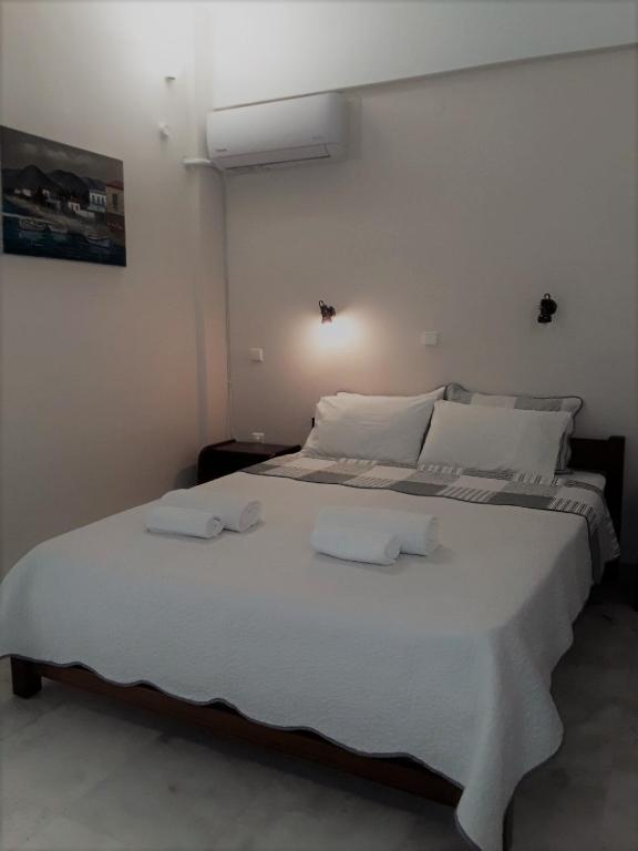 Postel nebo postele na pokoji v ubytování Areti & Maria Apartments