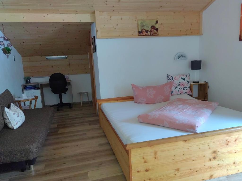 Postel nebo postele na pokoji v ubytování Haus Monika