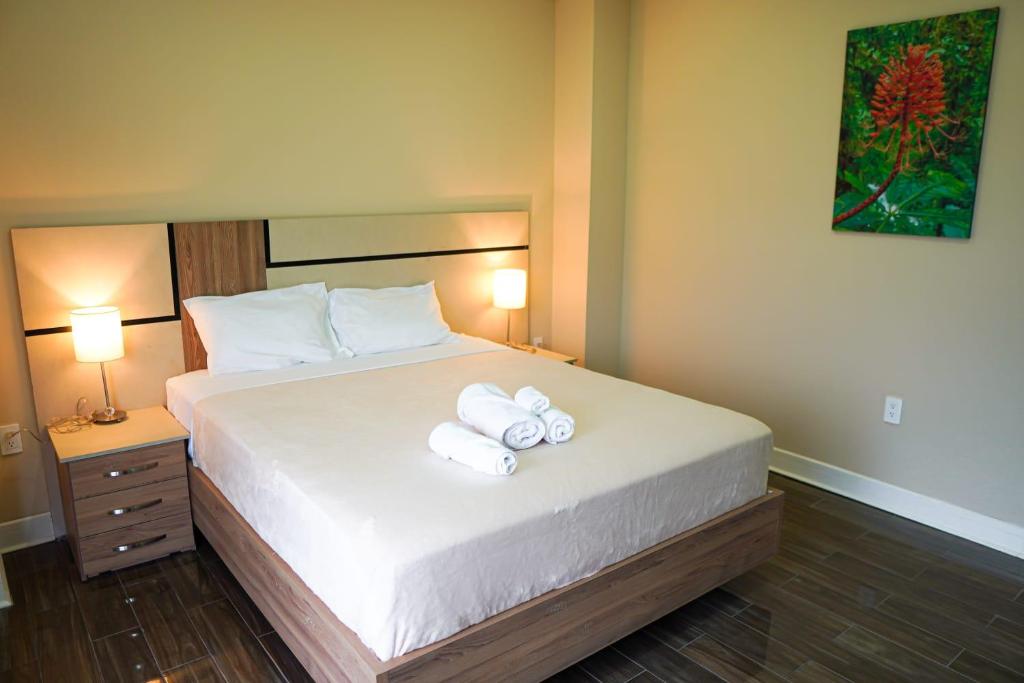 Postel nebo postele na pokoji v ubytování THE VIEW HOTEL