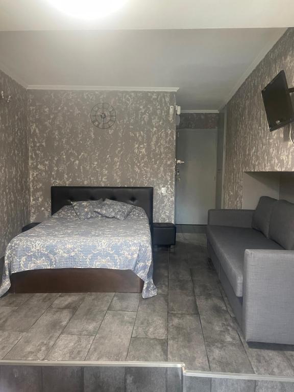 מיטה או מיטות בחדר ב-Estudio Loft