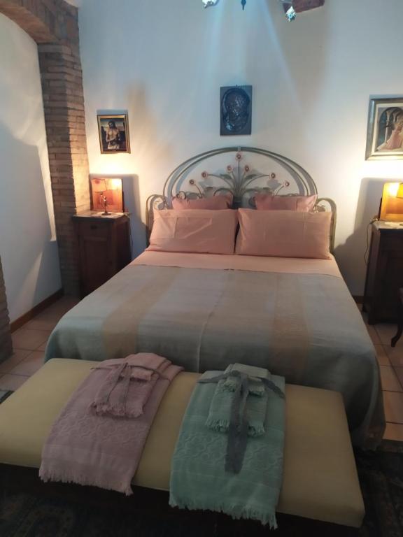 Łóżko lub łóżka w pokoju w obiekcie Centro Storico Perugia - Vista Su Assisi