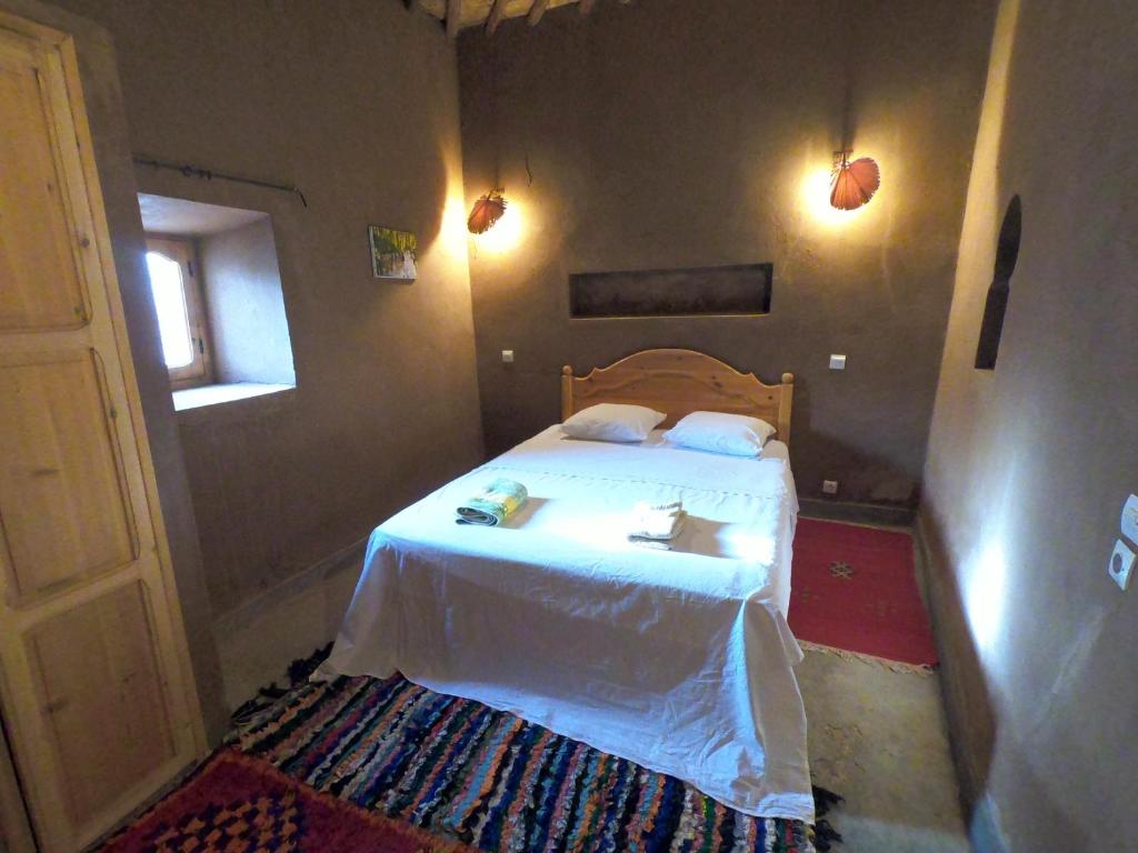 Postel nebo postele na pokoji v ubytování Authentic riad & activities Erg