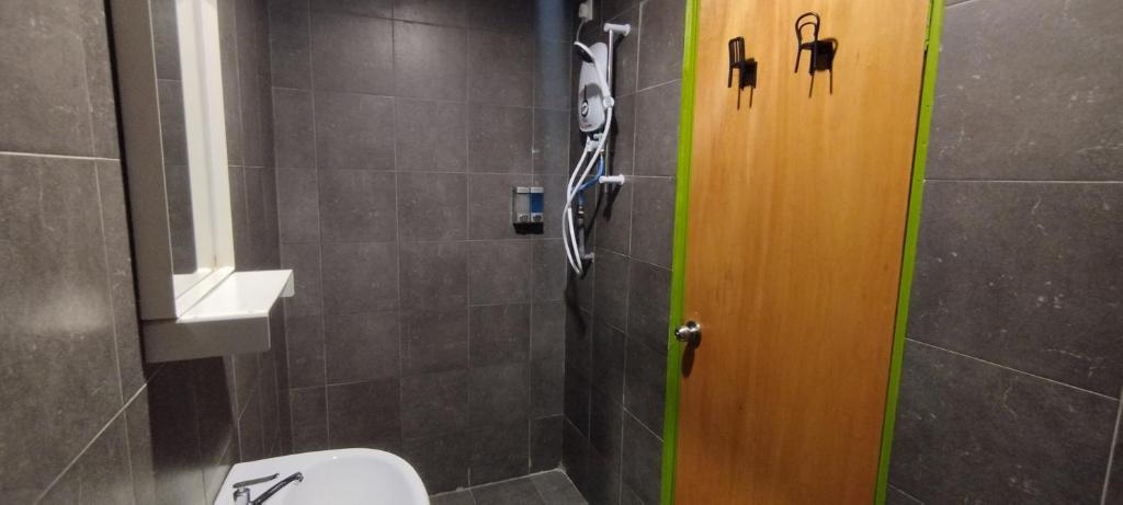 Koupelna v ubytování Olive Bedz Hotel