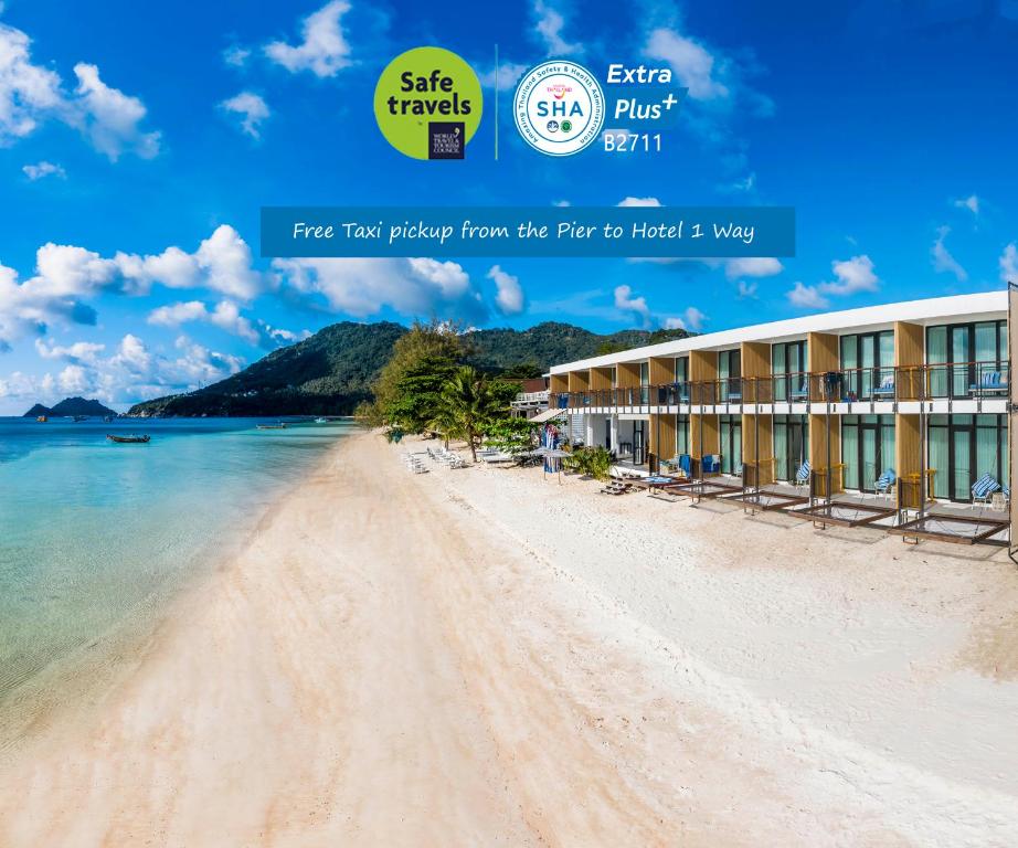 - Vistas a la playa del hotel de arrecifes en Blue Tao Beach Hotel - SHA Plus, en Ko Tao