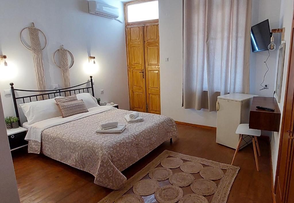 Postel nebo postele na pokoji v ubytování Casa di Syrii