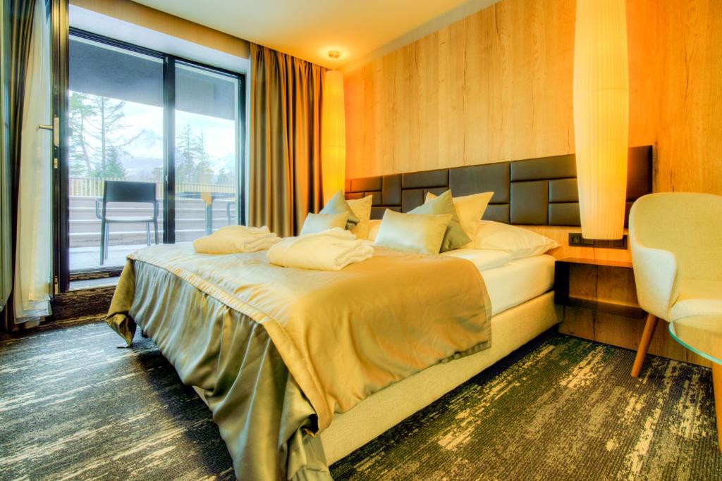 Postel nebo postele na pokoji v ubytování Hotel Hills
