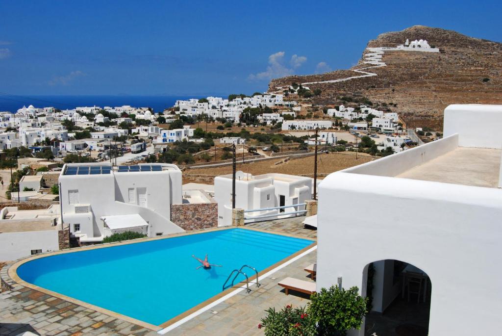 a view of a pool from a villa at Solaris in Chora Folegandros
