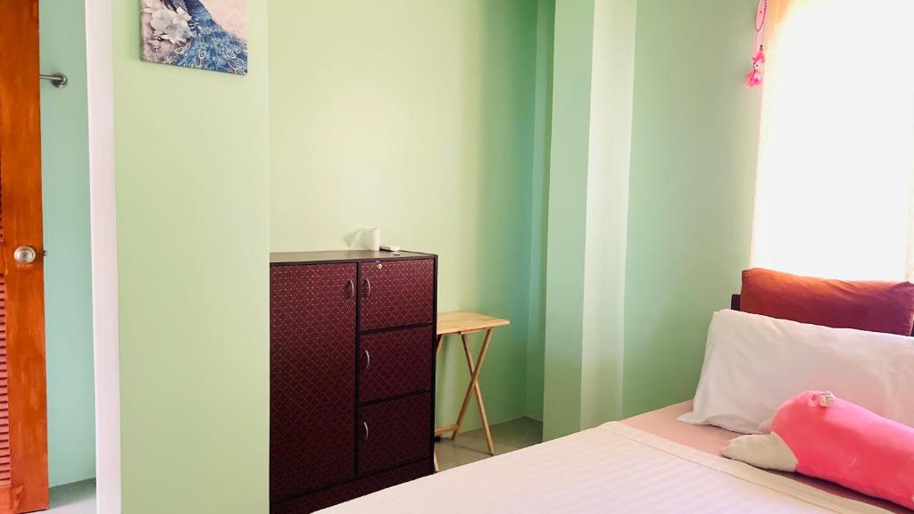 Postel nebo postele na pokoji v ubytování Sephreen Home stay