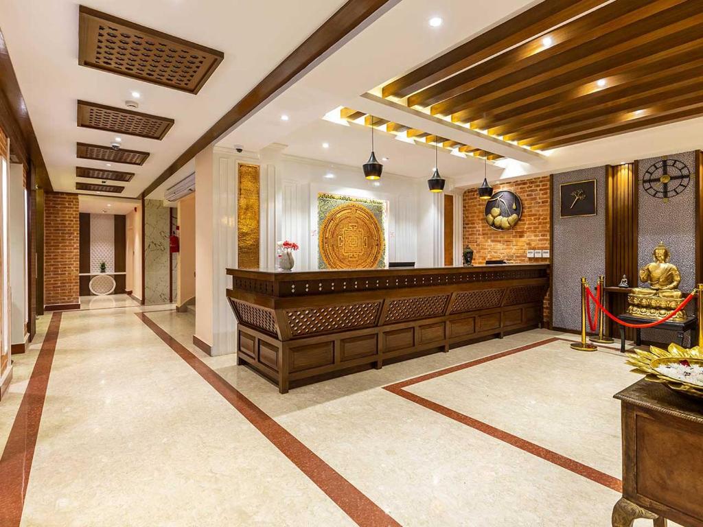 a court room with a bench and a judge at Dream International Hotel in Lumbini