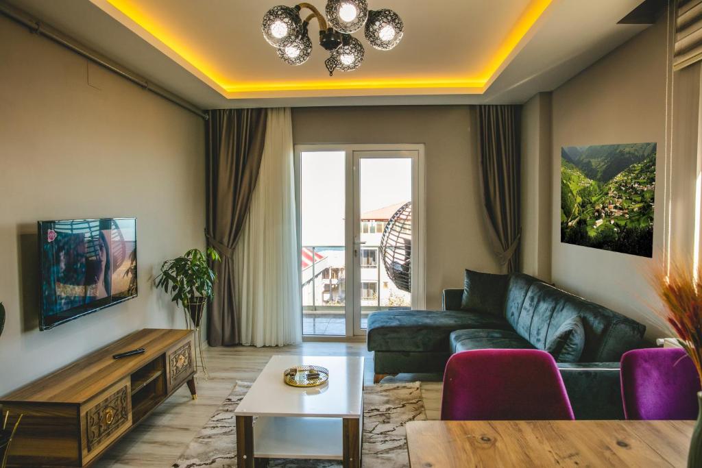 TV a/nebo společenská místnost v ubytování Sulduz Hotel Apart & SPA