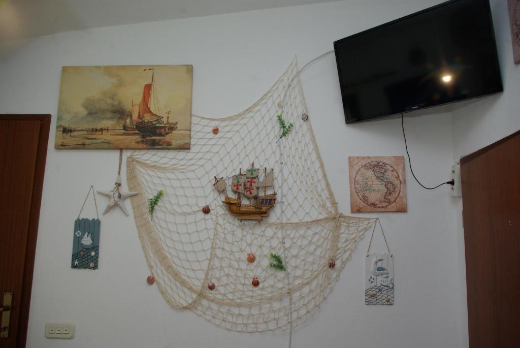 TV a/nebo společenská místnost v ubytování Rooms Tia