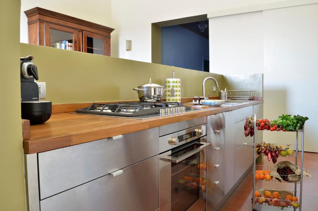 A kitchen or kitchenette at Don Giovanni Charme Apartment