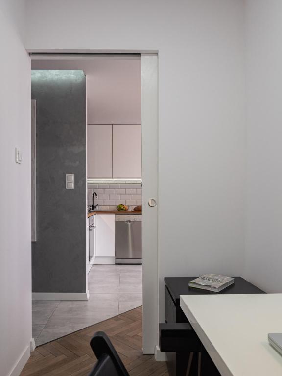 Kuchyň nebo kuchyňský kout v ubytování Coco Apartments Kołobrzeska 42