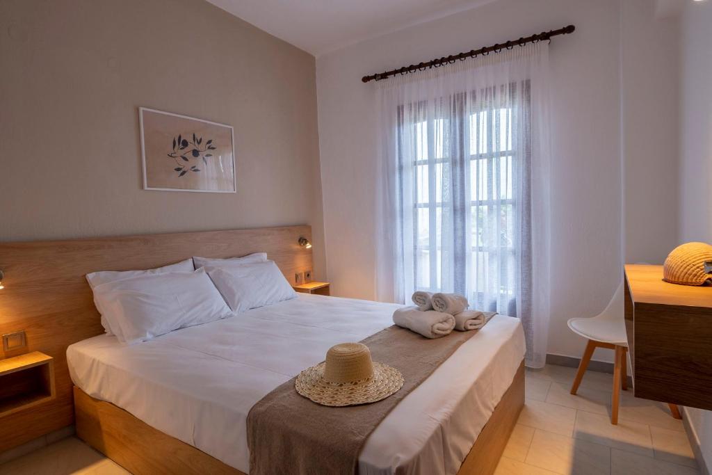 Postel nebo postele na pokoji v ubytování Seaview Studios Kriopigi