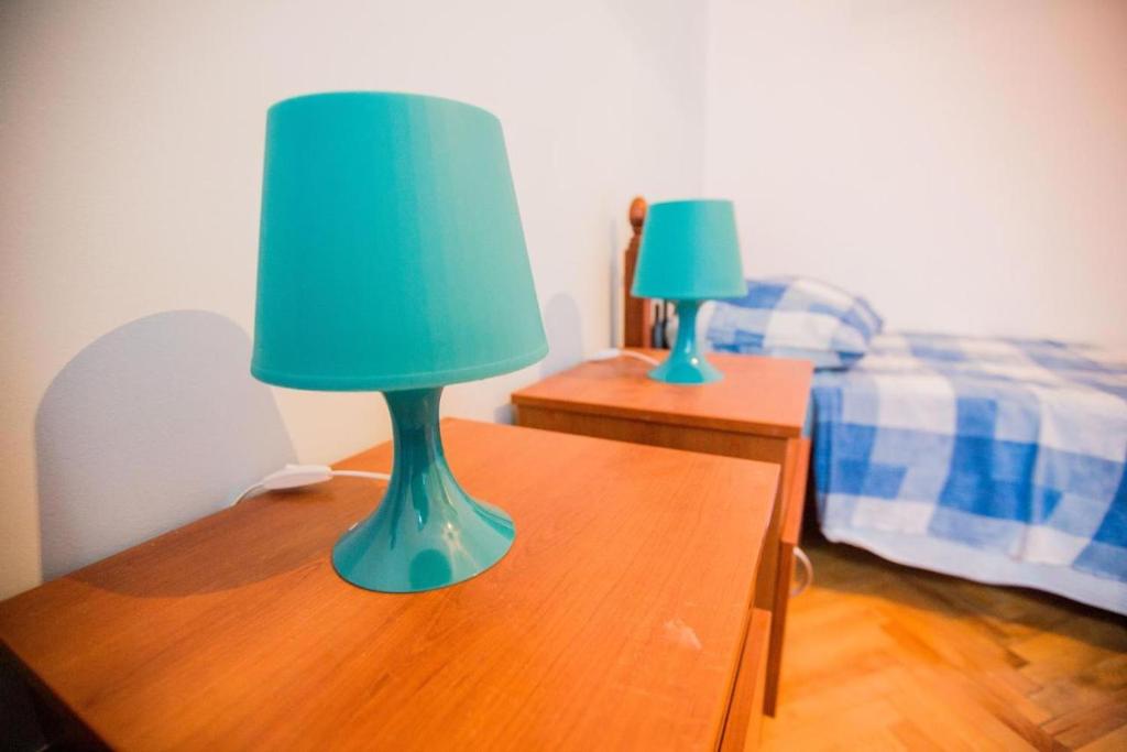 Postel nebo postele na pokoji v ubytování Apartmani M&S