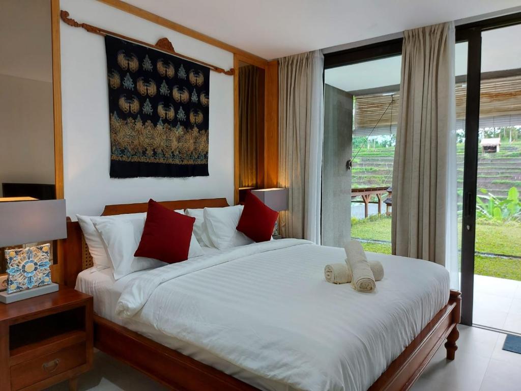 Postel nebo postele na pokoji v ubytování Serenity Private Villa Mas Ubud
