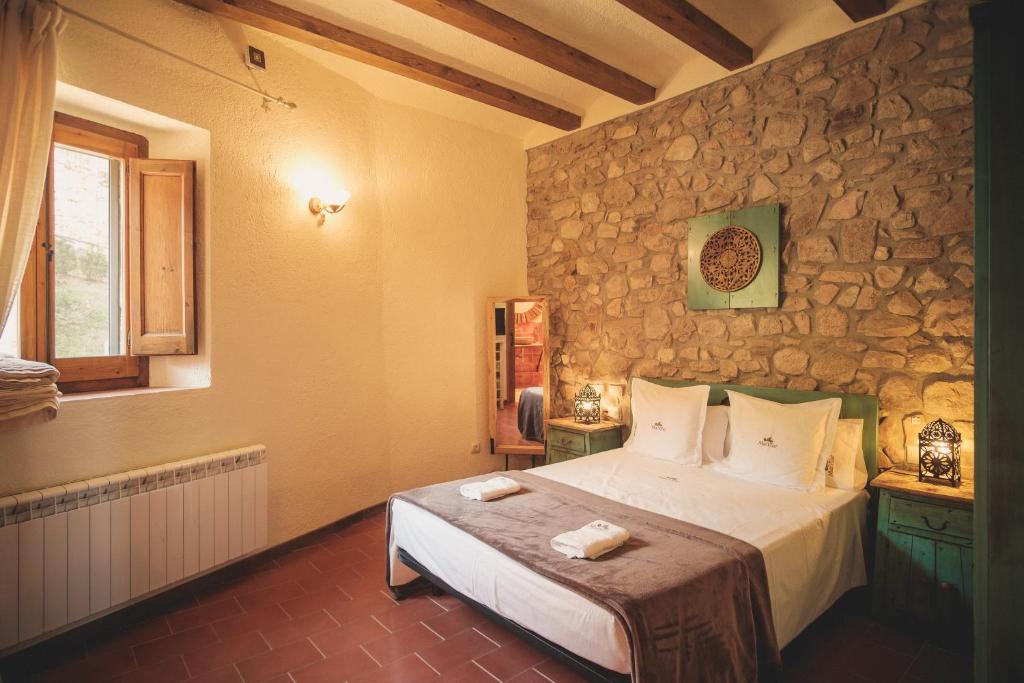 Postel nebo postele na pokoji v ubytování Agroturismo Mas Vilar, feel at home