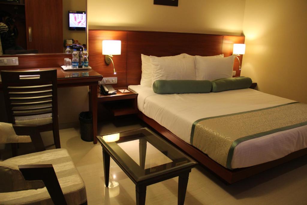 Postel nebo postele na pokoji v ubytování Hotel Green Olive