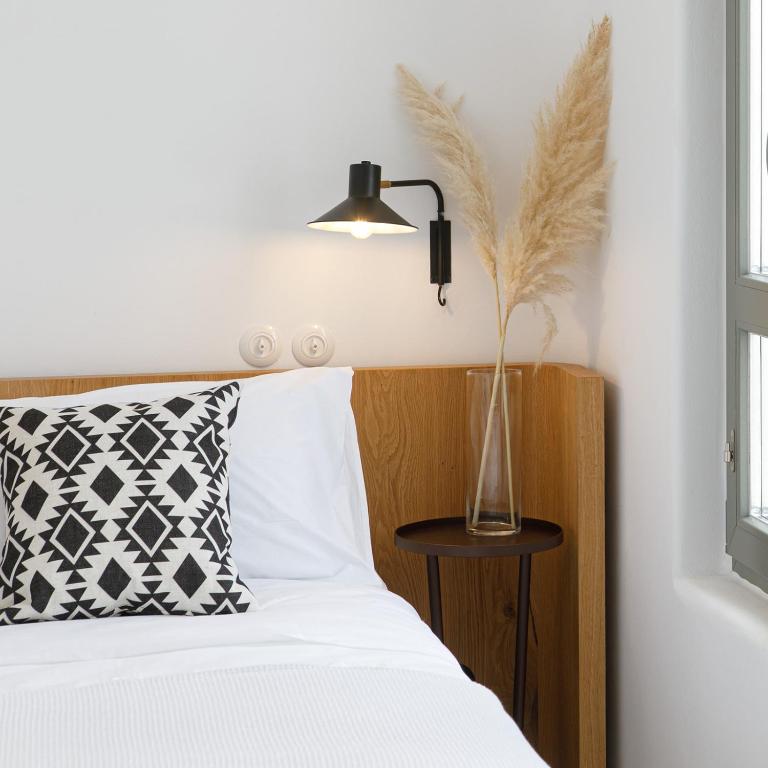 Posteľ alebo postele v izbe v ubytovaní Alio Naxos Luxury Suites